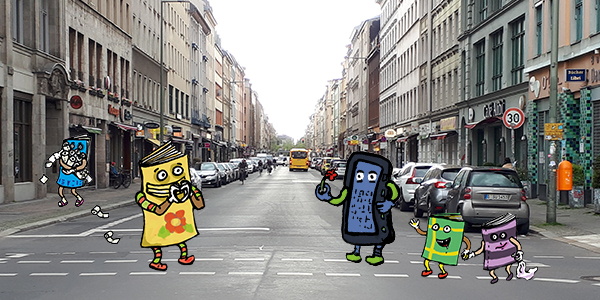 Fotomontage, Foto der Oranienstraße, bunte gezeichnete Buch-Wesen überqueren die Straße