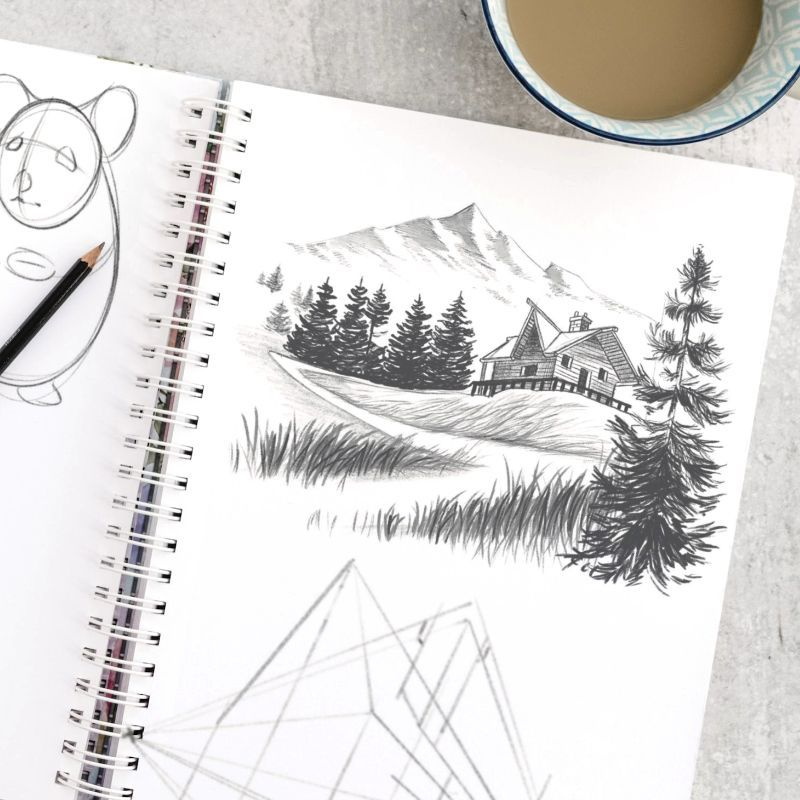 Skizzenbuch, aufgeschlagen, Bleistiftskizze einer Berglandschaft mit Bäumen
